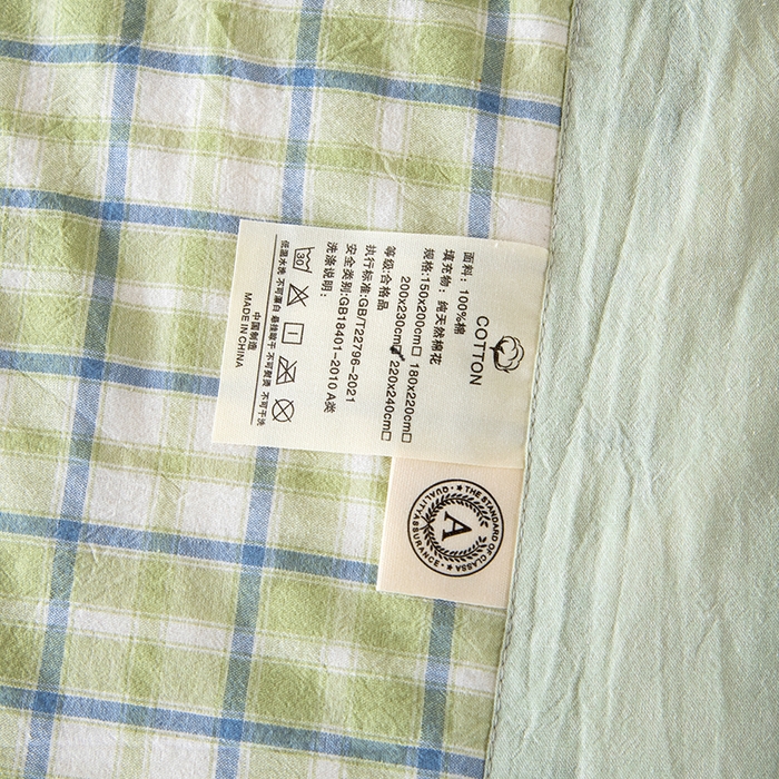 91家纺网 家纺一手货源 找家纺 三俏家纺 2025新款新疆棉花被夏被100%里外全棉棉花夏被无印风全棉色织水洗棉夏凉被空调被春秋被单人可机洗-风格二 新芽