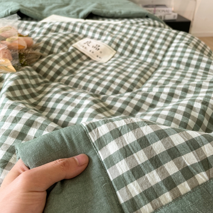 91家纺网 家纺一手货源 找家纺 2025梦初语新款无印风棉花夏被 绿小格