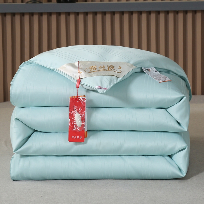 91家纺网 家纺一手货源 找家纺 2025新款全棉缎条贡缎提花被子被芯夏凉被春秋被冬被二合一子母被 绿色