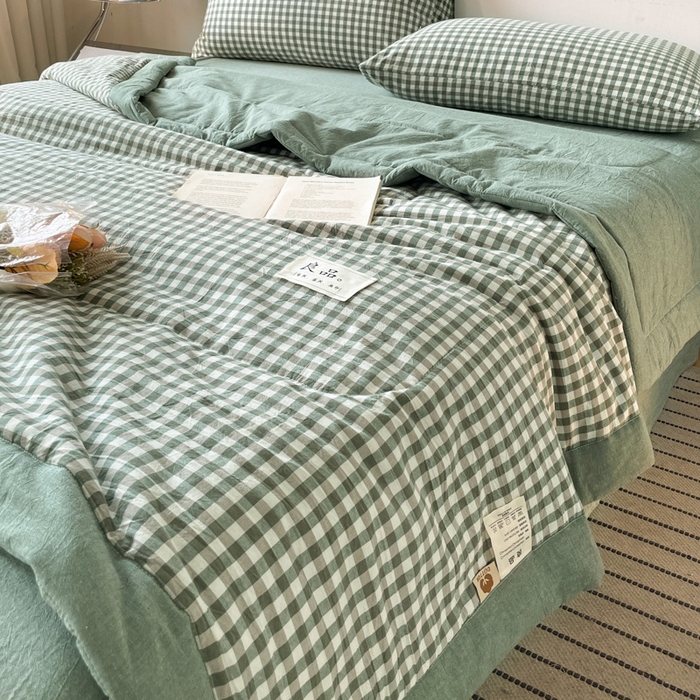 91家纺网 家纺一手货源 找家纺 2025梦初语新款无印风棉花夏被 绿小格
