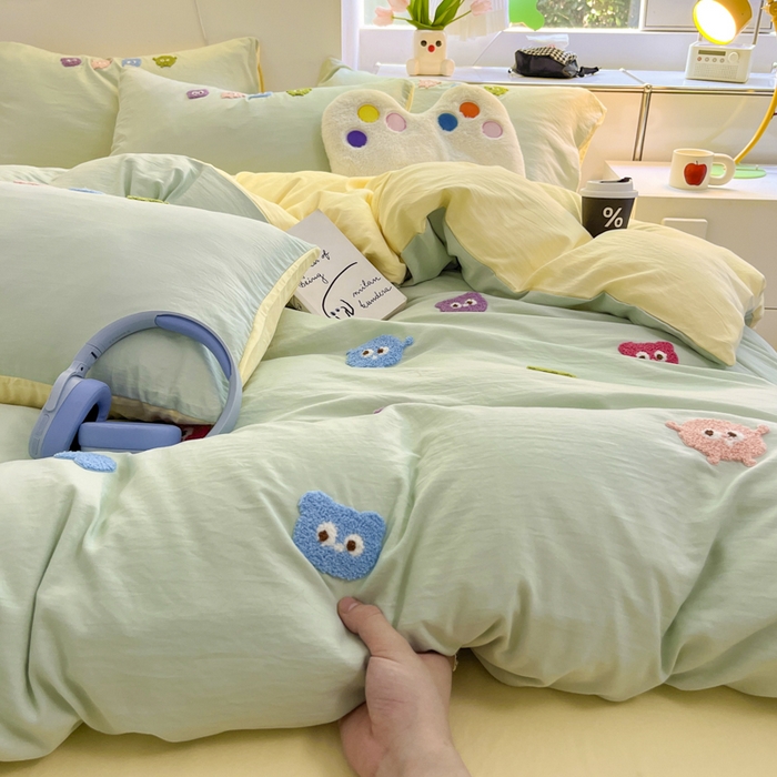 91家纺网 家纺一手货源 找家纺 优卡迪家纺馆 2025新款水洗棉毛巾绣四件套（下载文件夹包含买家秀） 开心怪兽-绿