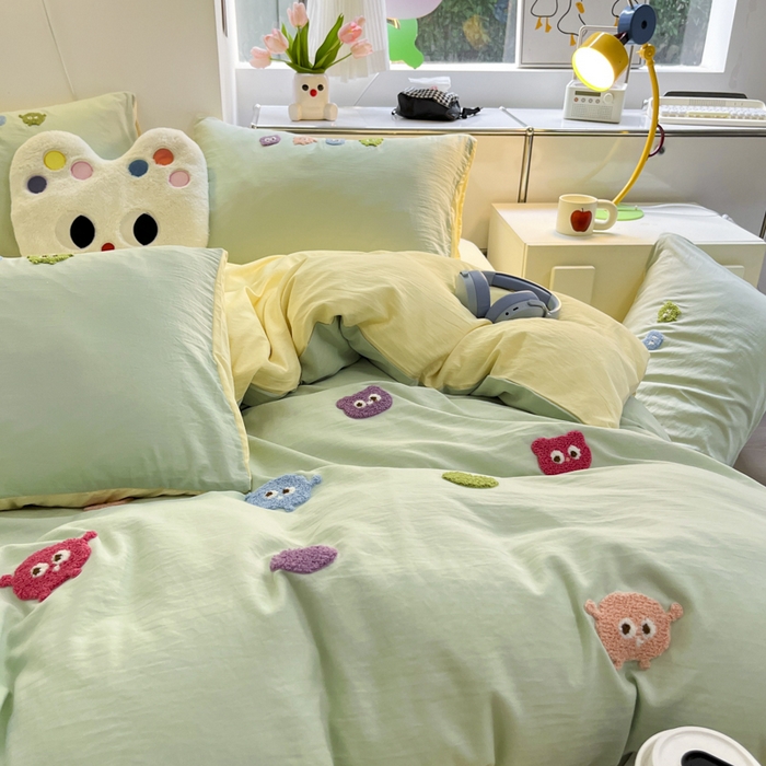 91家纺网 家纺一手货源 找家纺 优卡迪家纺馆 2025新款水洗棉毛巾绣四件套（下载文件夹包含买家秀） 开心怪兽-绿