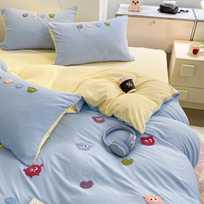 91家纺网 家纺一手货源 找家纺 优卡迪家纺馆 2025新款水洗棉毛巾绣四件套（下载文件夹包含买家秀） 开心怪兽-天蓝奶黄