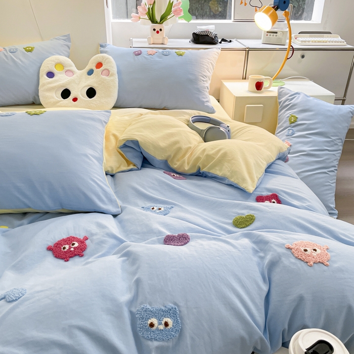 91家纺网 家纺一手货源 找家纺 优卡迪家纺馆 2025新款水洗棉毛巾绣四件套（下载文件夹包含买家秀） 开心怪兽-天蓝奶黄