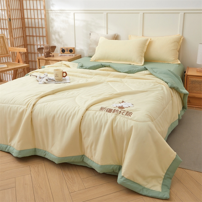 91家纺网 家纺一手货源 找家纺 西域种棉人·千百笠 2025新款A类100%新疆棉花夏凉被纯棉全棉填充毛巾绣绣花纯色双拼原棉空调被夏被 云暖-奶油黄