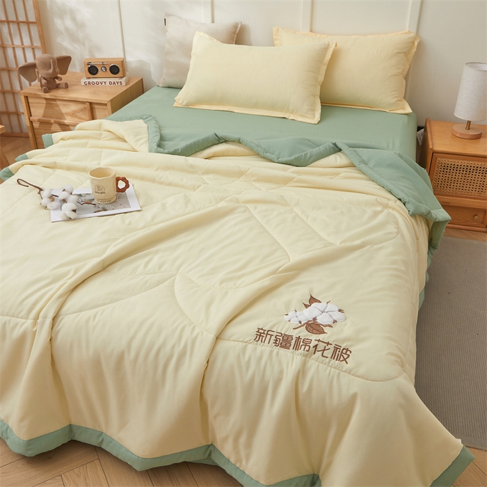 91家纺网 家纺一手货源 找家纺 西域种棉人·千百笠 2025新款A类100%新疆棉花夏凉被纯棉全棉填充毛巾绣绣花纯色双拼原棉空调被夏被 云暖-奶油黄