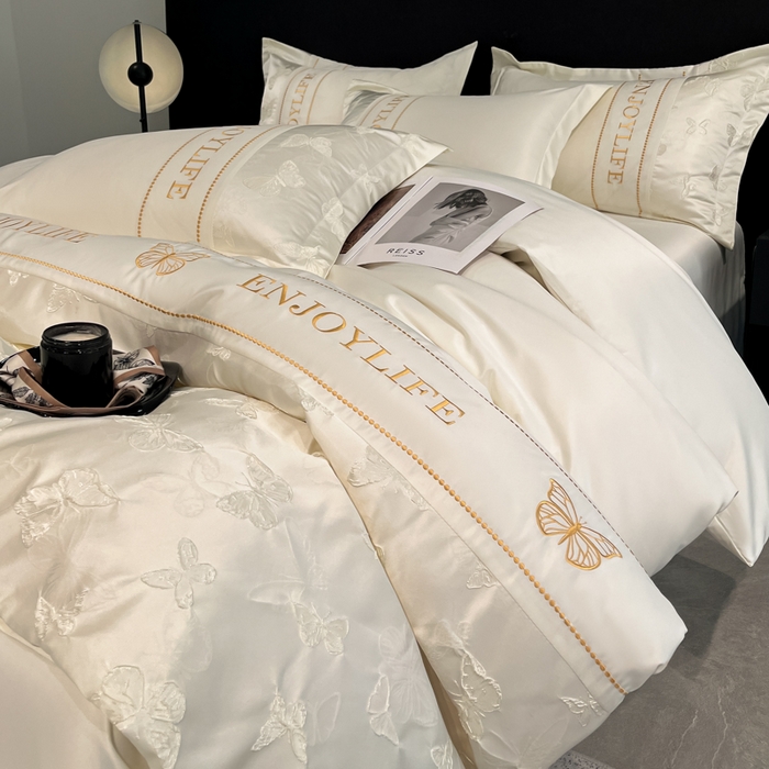 91家纺网 家纺一手货源 找家纺 米彩家纺 2025新款A类水洗真丝金丝浮雕提花绣花四件套 富蝶-奶白