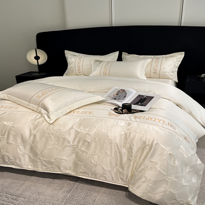 91家纺网 家纺一手货源 找家纺 米彩家纺 2025新款A类水洗真丝金丝浮雕提花绣花四件套 富蝶-奶白