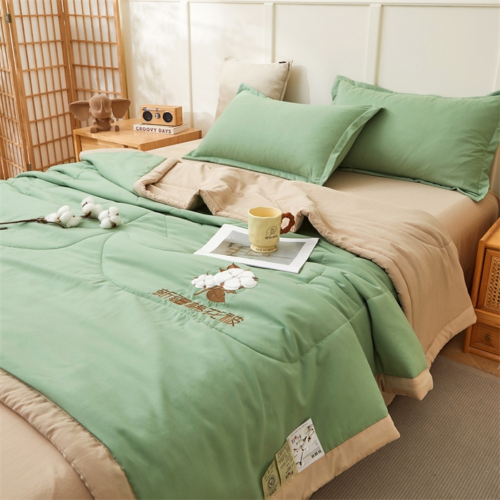 91家纺网 家纺一手货源 找家纺 西域种棉人·千百笠 2025新款A类100%新疆棉花夏凉被纯棉全棉填充毛巾绣绣花纯色双拼原棉空调被夏被 云暖-青果绿