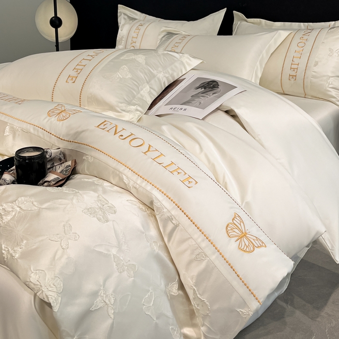 91家纺网 家纺一手货源 找家纺 米彩家纺 2025新款A类水洗真丝金丝浮雕提花绣花四件套 富蝶-奶白