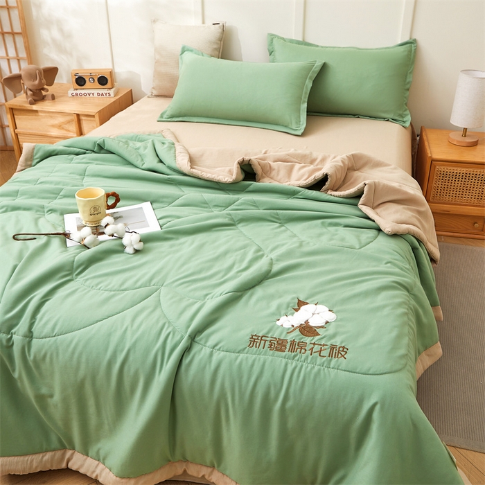 91家纺网 家纺一手货源 找家纺 西域种棉人·千百笠 2025新款A类100%新疆棉花夏凉被纯棉全棉填充毛巾绣绣花纯色双拼原棉空调被夏被 云暖-青果绿