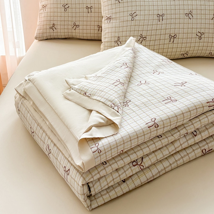 91家纺网 家纺一手货源 找家纺 金喜 2025新款小清新风格有氧针织双层纱大豆被夏被四件套 蝴蝶结