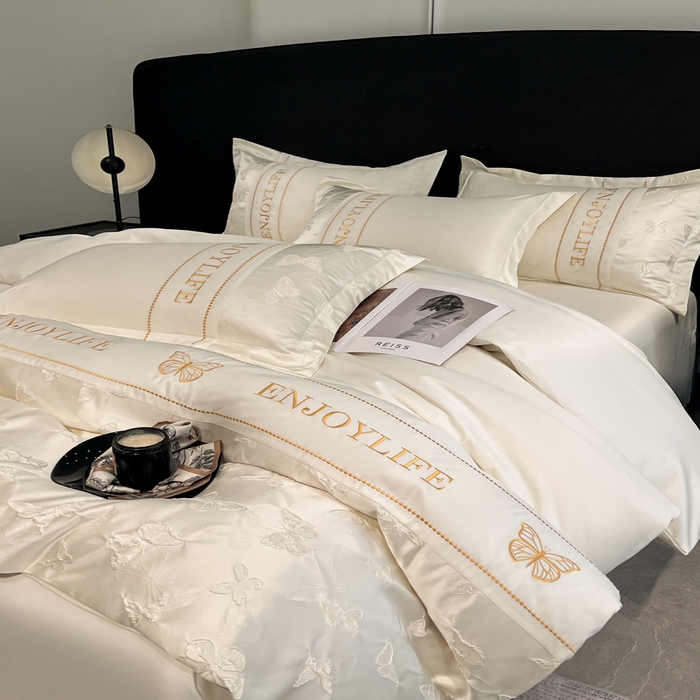 91家纺网 家纺一手货源 找家纺 米彩家纺 2025新款A类水洗真丝金丝浮雕提花绣花四件套 富蝶-奶白