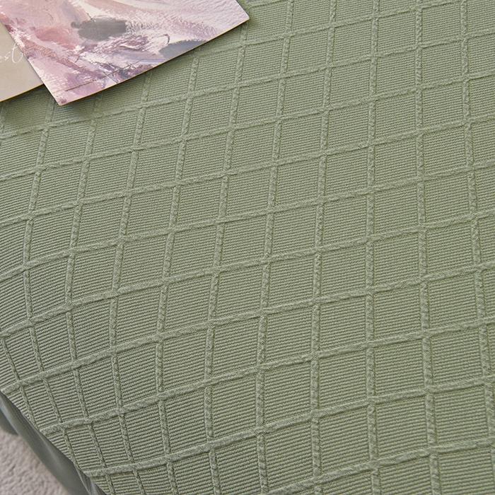 91家纺网 家纺一手货源 找家纺 启博家纺 2025新款菱形格无扶手沙发床套 果绿