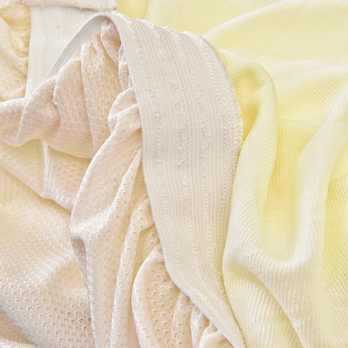 91家纺网 家纺一手货源 找家纺 启博家纺 2025新款菱形格无扶手沙发床套 米白