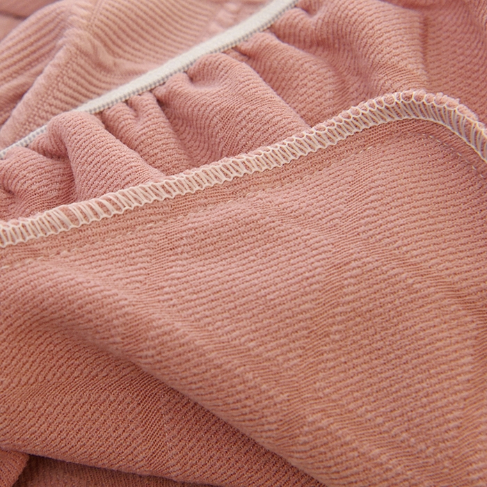 91家纺网 家纺一手货源 找家纺 启博家纺 2025新款菱形格功能款毛毛虫沙发套 桃粉