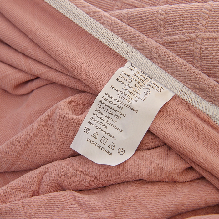 91家纺网 家纺一手货源 找家纺 启博家纺 2025新款菱形格功能款毛毛虫沙发套 桃粉