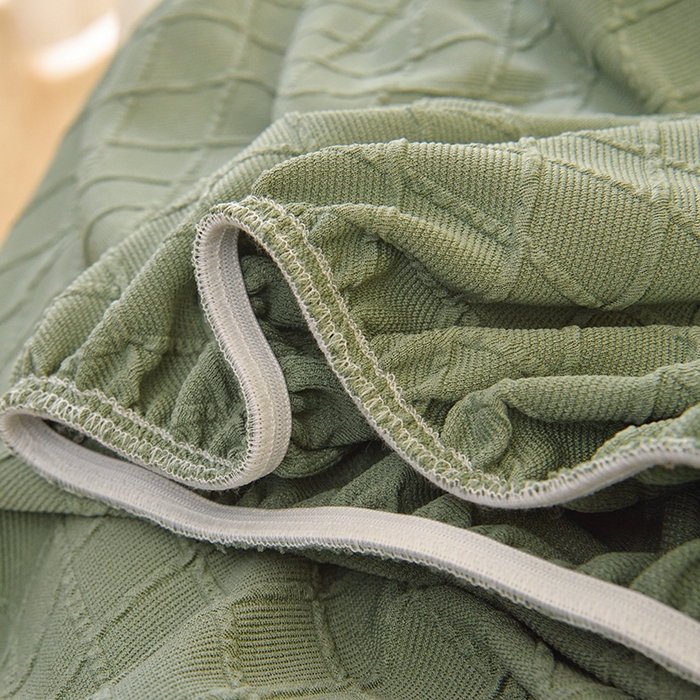 91家纺网 家纺一手货源 找家纺 启博家纺 2025新款菱形格功能款毛毛虫沙发套 果绿