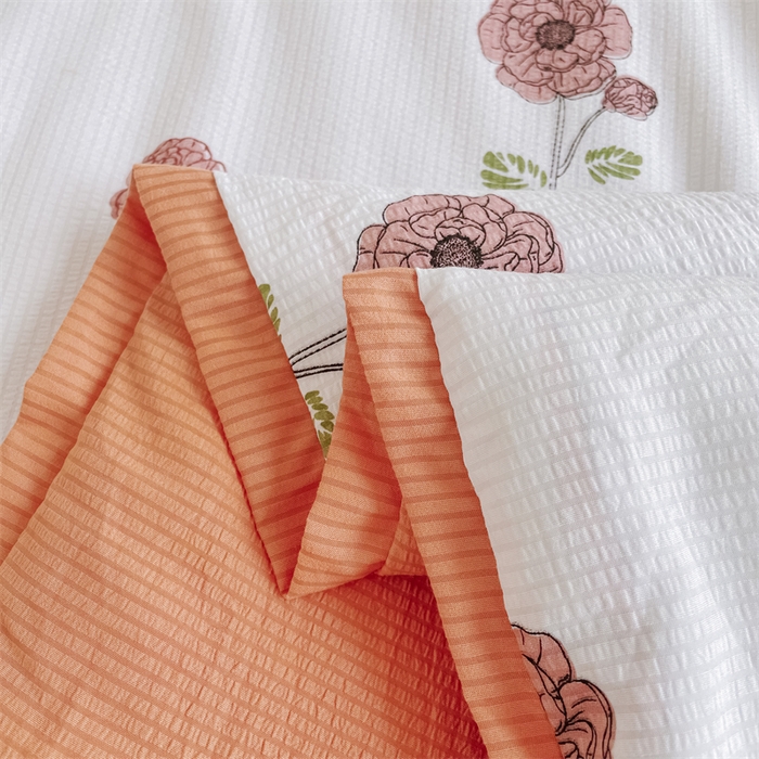 91家纺网 家纺一手货源 找家纺 南北家居 2025新款亲肤泡泡棉提花夏被 俏佳人