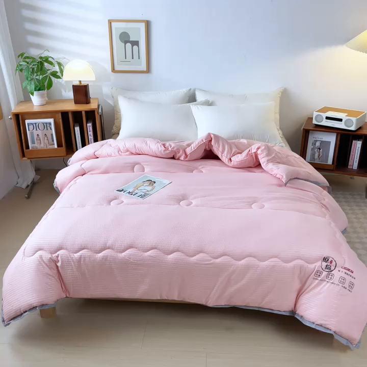 91家纺网 家纺一手货源 找家纺 百花王2025新款泡泡棉纯色简约升级款大豆被子被芯 原棉大豆被泡泡升级款 -粉色