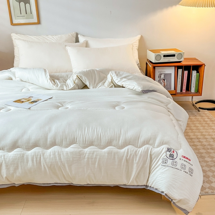 91家纺网 家纺一手货源 找家纺 百花王2025新款泡泡棉纯色简约升级款大豆被子被芯 原棉大豆被泡泡升级款 -奶白色