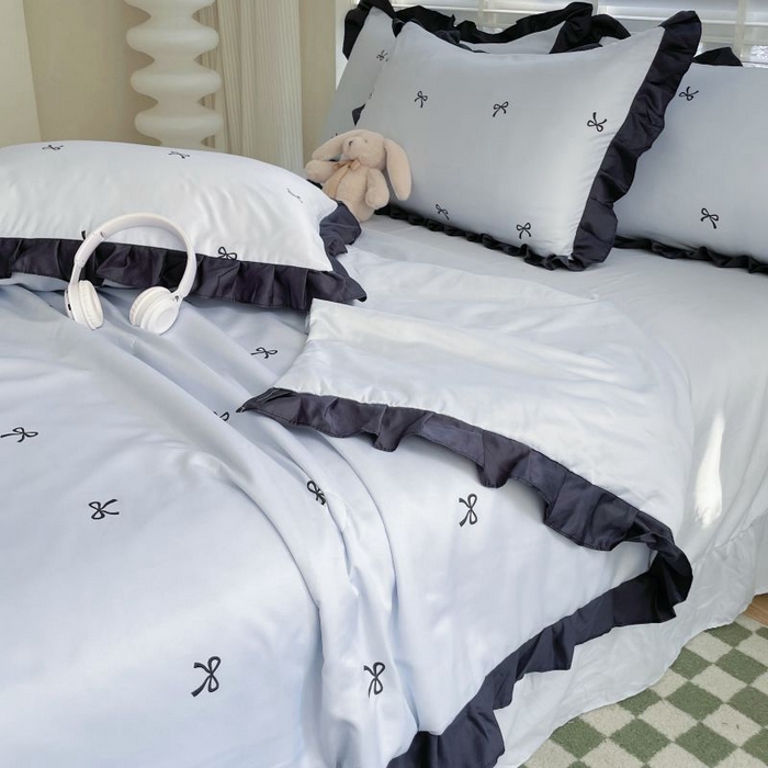 91家纺网 家纺一手货源 找家纺 绣女坊  2025新款水洗天丝夏被四件套 蓝色蝴蝶结