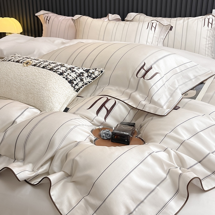 91家纺网 家纺一手货源 找家纺 2025夏季A类天丝棉夹棉床盖床笠四件套全棉纯棉纯色长绒棉真丝保护罩高级感条纹床上用品 艾诺-米