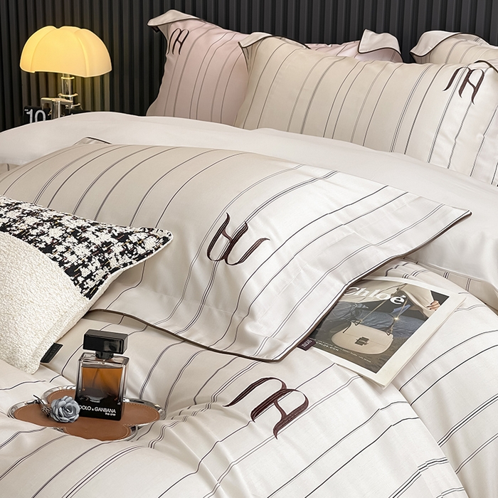 91家纺网 家纺一手货源 找家纺 2025夏季A类天丝棉夹棉床盖床笠四件套全棉纯棉纯色长绒棉真丝保护罩高级感条纹床上用品 艾诺-米