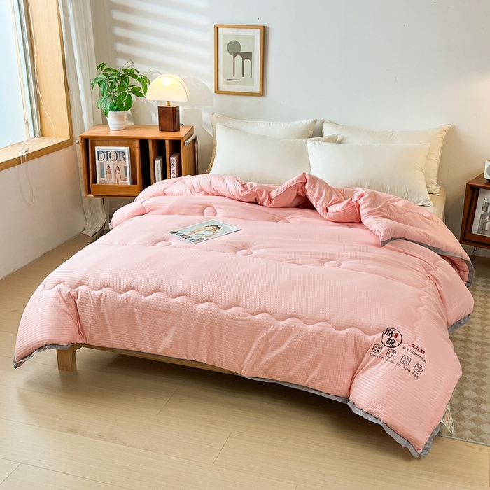 91家纺网 家纺一手货源 找家纺 百花王2025新款泡泡棉纯色简约升级款大豆被子被芯 原棉大豆被泡泡升级款 -粉色
