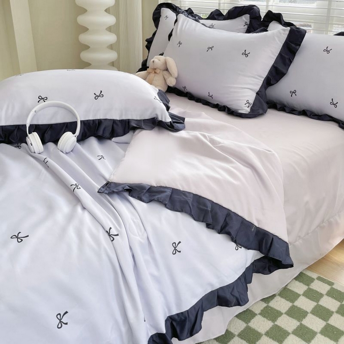 91家纺网 家纺一手货源 找家纺 绣女坊  2025新款水洗天丝夏被四件套 紫色蝴蝶结