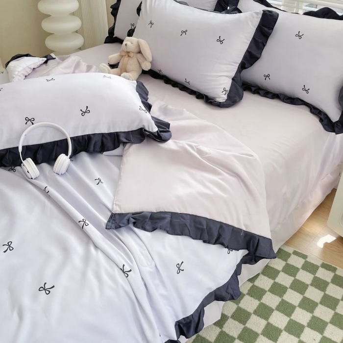 91家纺网 家纺一手货源 找家纺 绣女坊  2025新款水洗天丝夏被四件套 紫色蝴蝶结