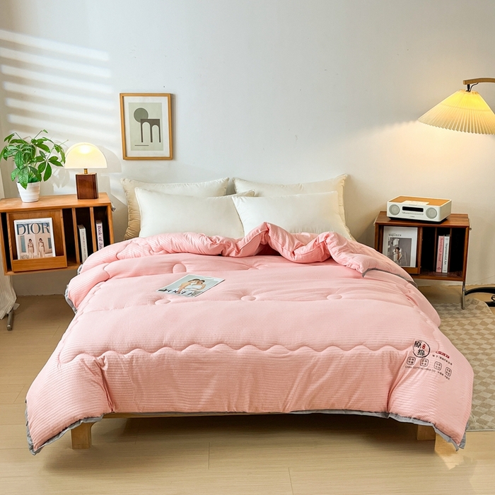 91家纺网 家纺一手货源 找家纺 百花王2025新款泡泡棉纯色简约升级款大豆被子被芯 原棉大豆被泡泡升级款 -粉色