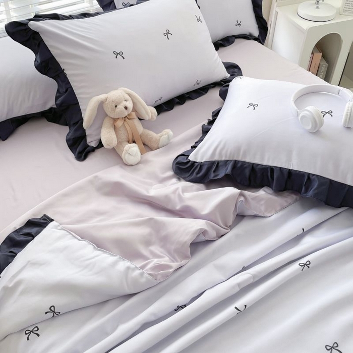 91家纺网 家纺一手货源 找家纺 绣女坊  2025新款水洗天丝夏被四件套 紫色蝴蝶结