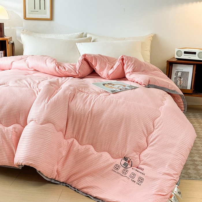 91家纺网 家纺一手货源 找家纺 百花王2025新款泡泡棉纯色简约升级款大豆被子被芯 原棉大豆被泡泡升级款 -粉色