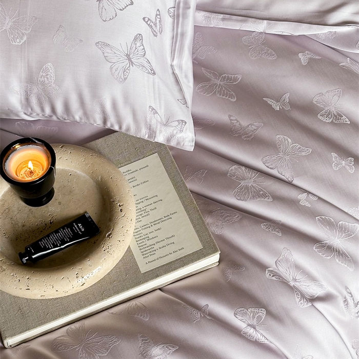 91家纺网 家纺一手货源 找家纺 FORTWO2025新款60支兰精天丝浮雕提花四件套		 云渺-紫