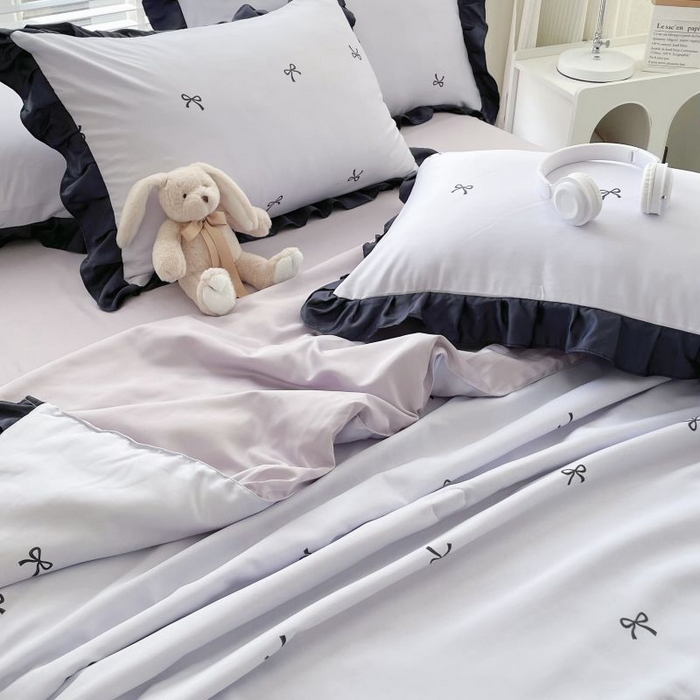 91家纺网 家纺一手货源 找家纺 绣女坊  2025新款水洗天丝夏被四件套 紫色蝴蝶结