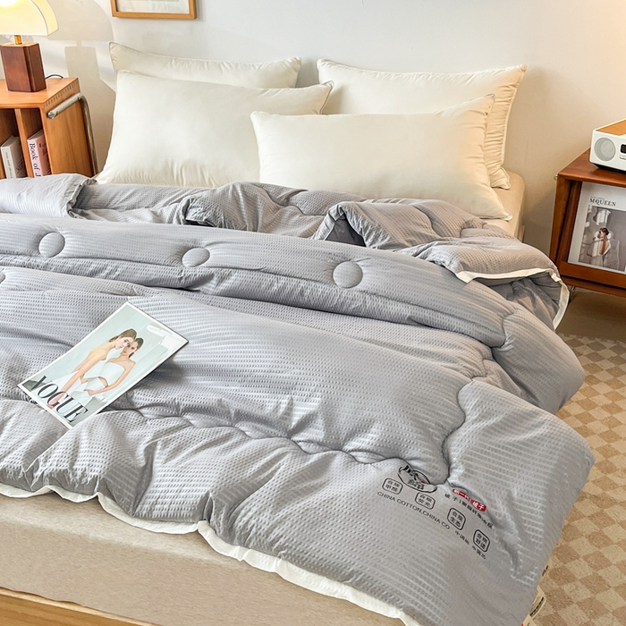 91家纺网 家纺一手货源 找家纺 百花王2025新款泡泡棉纯色简约升级款大豆被子被芯 原棉大豆被泡泡升级款 -灰色