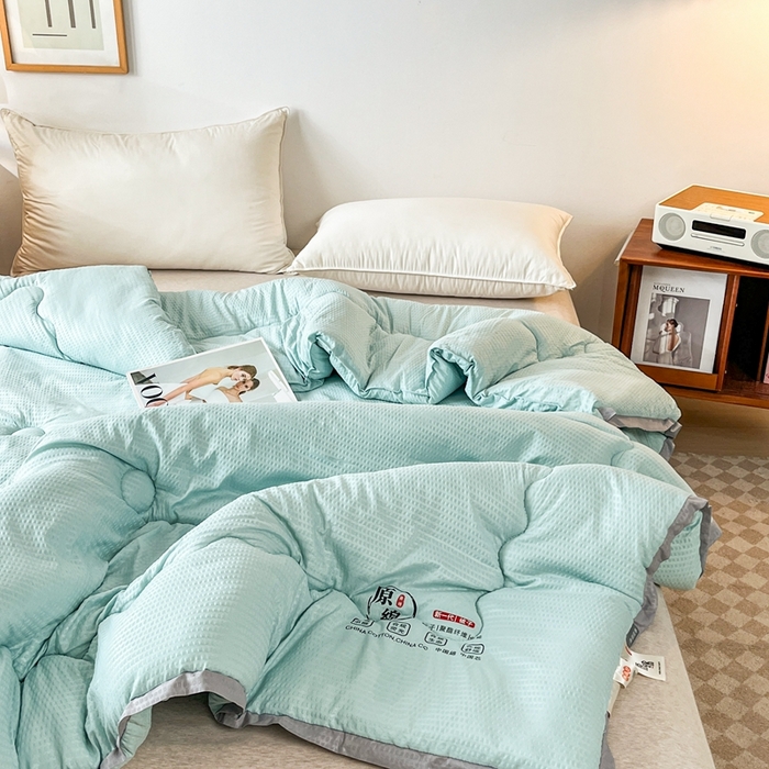 91家纺网 家纺一手货源 找家纺 百花王2025新款泡泡棉纯色简约升级款大豆被子被芯 原棉大豆被泡泡升级款 -墨绿色