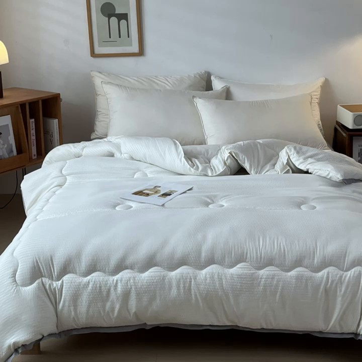 91家纺网 家纺一手货源 找家纺 百花王2025新款泡泡棉纯色简约升级款大豆被子被芯 原棉大豆被泡泡升级款 -奶白色