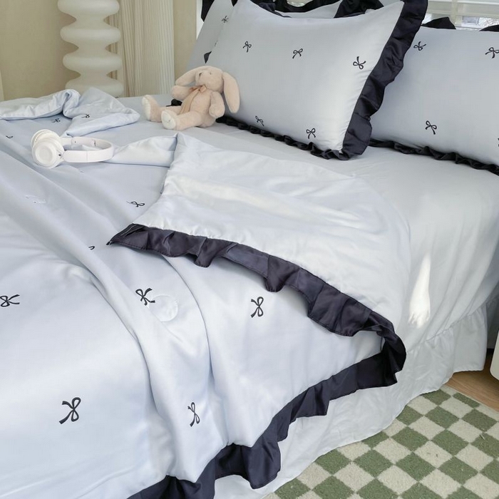 91家纺网 家纺一手货源 找家纺 绣女坊  2025新款水洗天丝夏被四件套 蓝色蝴蝶结