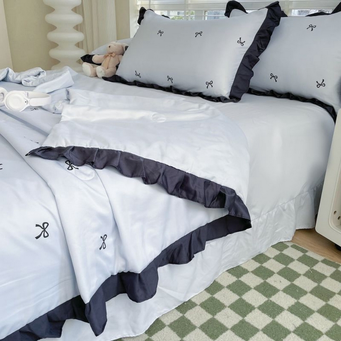 91家纺网 家纺一手货源 找家纺 绣女坊  2025新款水洗天丝夏被四件套 蓝色蝴蝶结