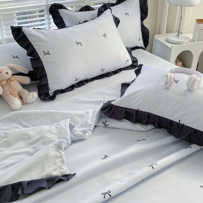 91家纺网 家纺一手货源 找家纺 绣女坊  2025新款水洗天丝夏被四件套 蓝色蝴蝶结