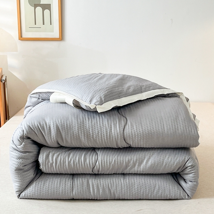 91家纺网 家纺一手货源 找家纺 百花王2025新款泡泡棉纯色简约升级款大豆被子被芯 原棉大豆被泡泡升级款 -灰色