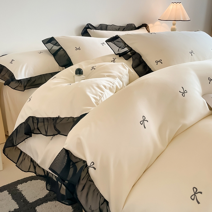 91家纺网 家纺一手货源 找家纺 绒世界 2025新款小清新美拉德水洗冰丝套件四件套 蝴蝶结