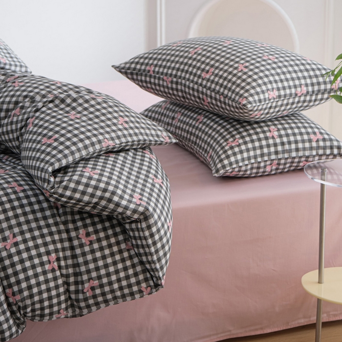 91家纺网 家纺一手货源 找家纺 布可家纺 2025新款水洗棉印花四件套系列 灰格蝴蝶结