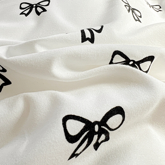 91家纺网 家纺一手货源 找家纺 艾橙 2025新款法式赫本风水洗棉印花雪纺花边单被套 黑色蝴蝶结