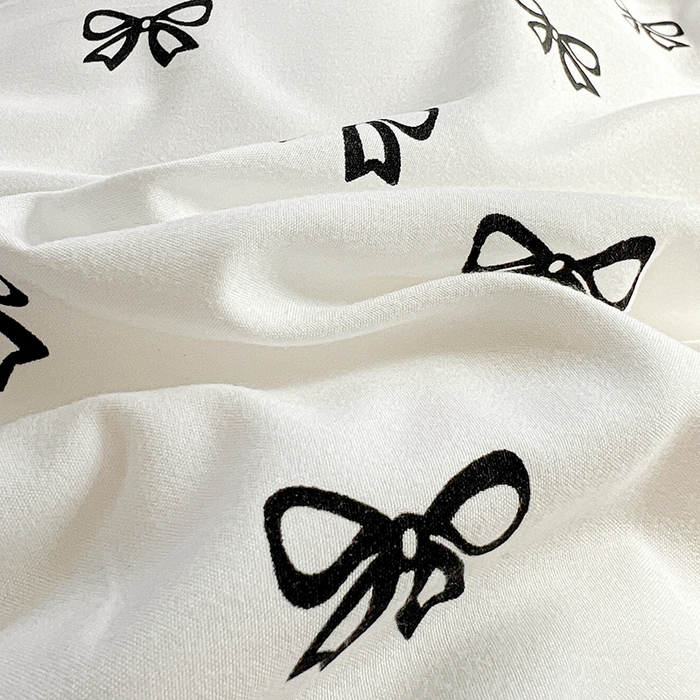 91家纺网 家纺一手货源 找家纺 艾橙家纺2025新款法式赫本风水洗棉印花雪纺花边单床笠 黑色蝴蝶结