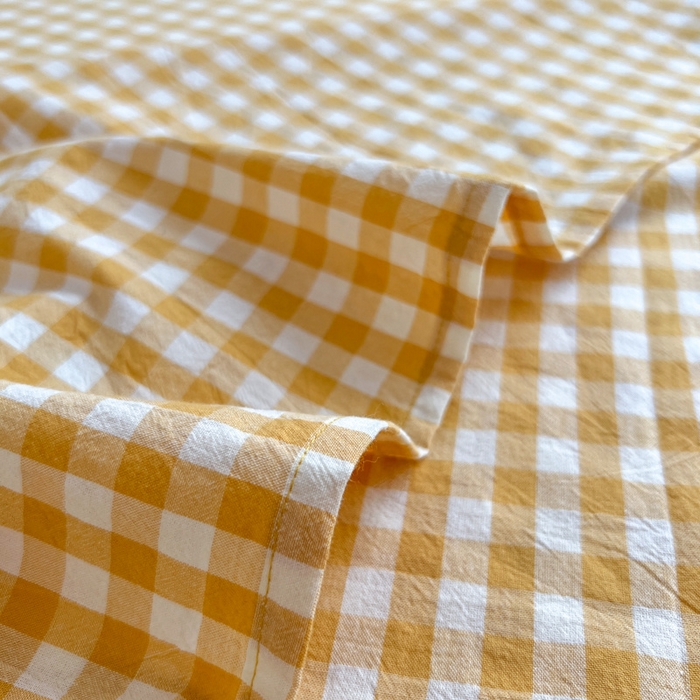 91家纺网 家纺一手货源 找家纺 2025新款水洗棉单床单 淡黄小格