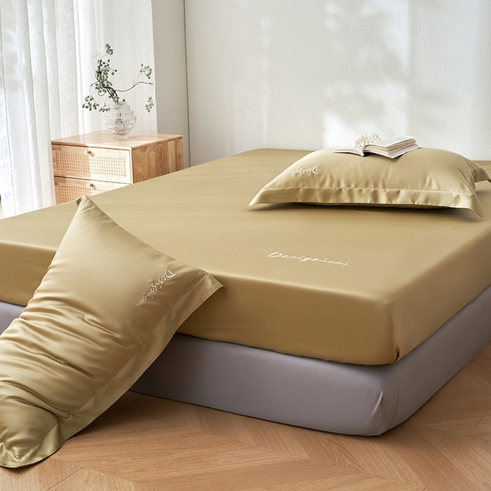 91家纺网 家纺一手货源 找家纺 黛舒家居 2025新款60S兰精天丝纯色简绣单床笠 琥珀黄