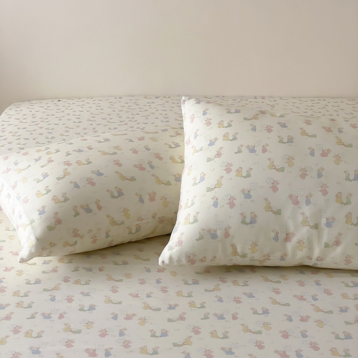 91家纺网 家纺一手货源 找家纺 时光里 2025新款双层纱系列卡通风枕套 小兔乖乖